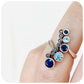 blue sapphire and topaz vintage style cocktail ring