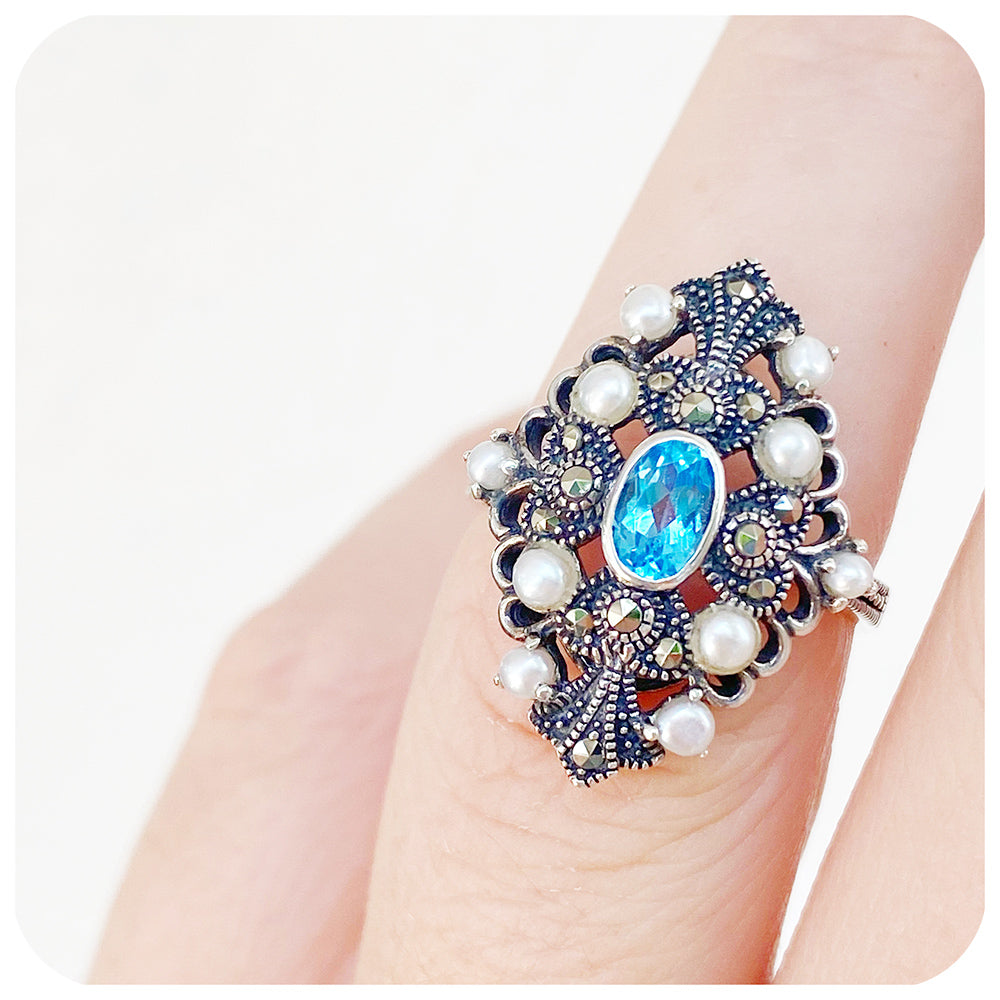oval cut blue topaz and fresh water pearl vintage inspired ring