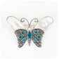 The Butterfly, a Mother of Pearl and London Blue Topaz Brooch