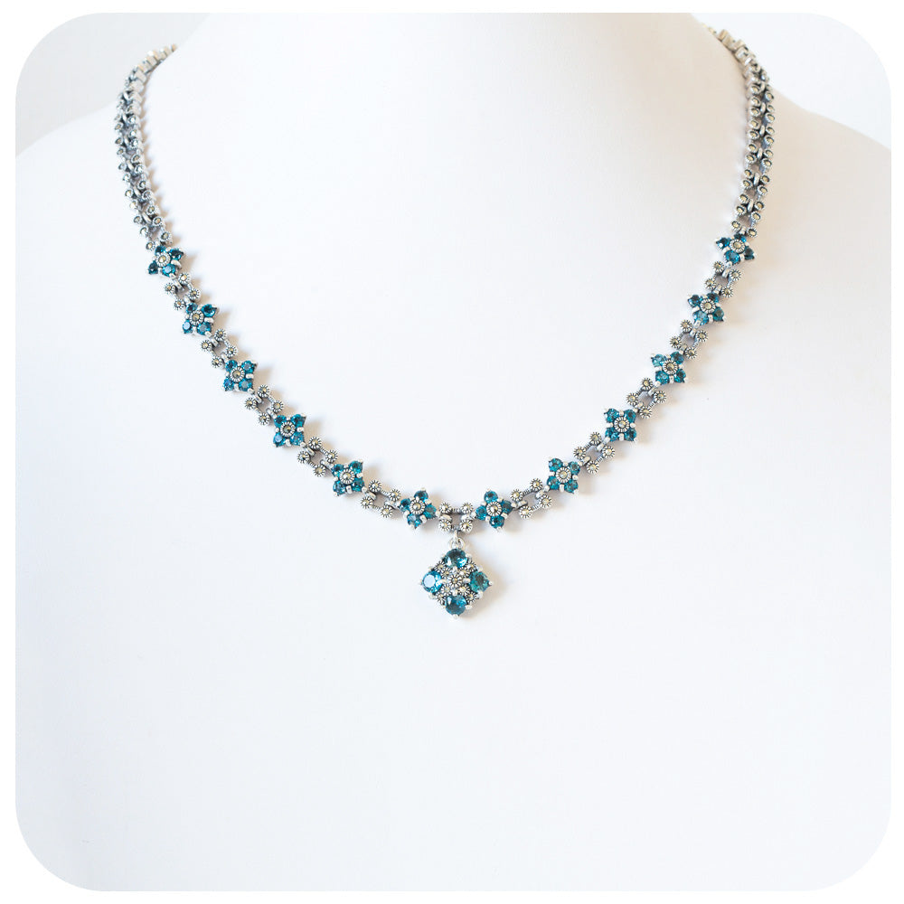 Silver Blue Topaz with Cubic Zirconia and Blue Enamel Snowflake Necklace