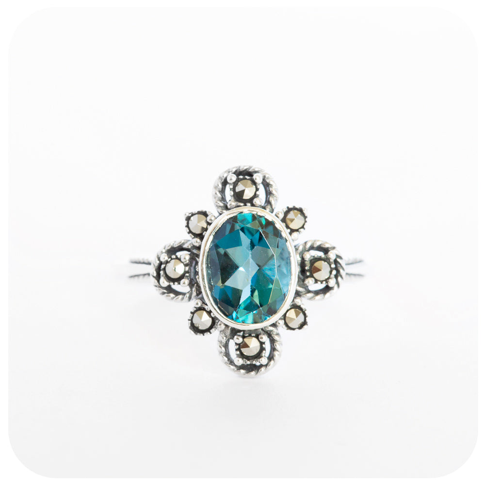 Oval cut London Blue Topaz and Marcasite Flower Ring in Sterling Silver