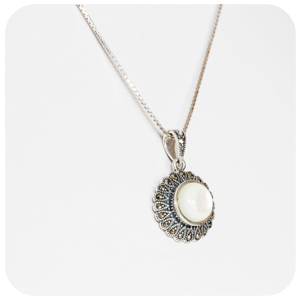 White Mother of Pearl and Marcasite Pendant and Chain in Sterling Silver