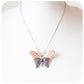The Butterfly, a Mother of Pearl and Amethyst Pendant and Brooch