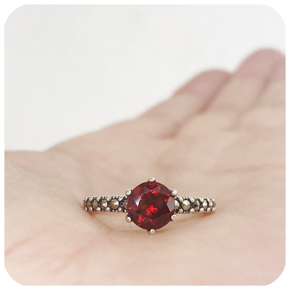 The Garnet Solitaire in Sterling Silver with Marcasite