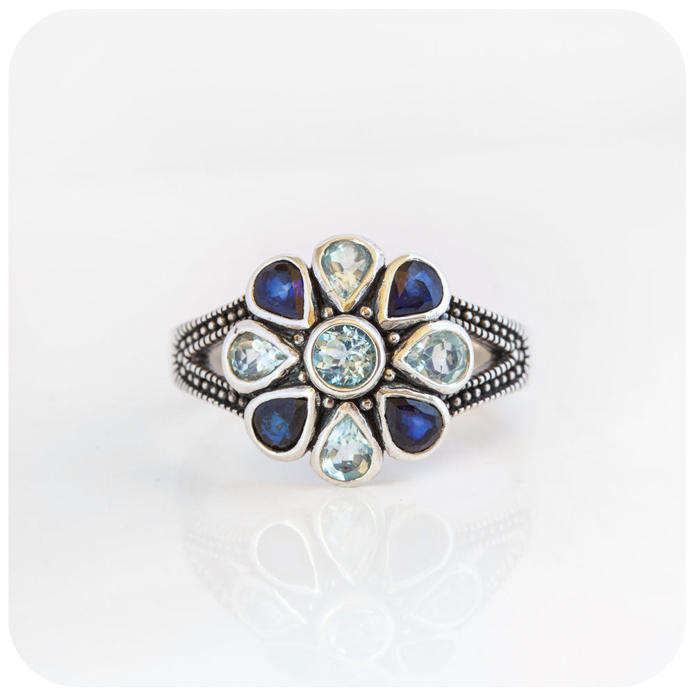 The Sapphire and Sky Blue Topaz Flower Ring in Sterling Silver