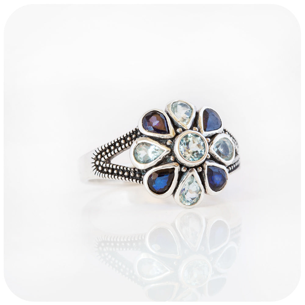 The Sapphire and Sky Blue Topaz Flower Ring in Sterling Silver