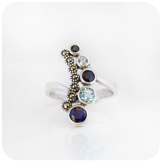 blue sapphire and topaz vintage style cocktail ring