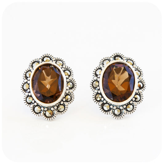 oval cut brown smoky quartz stud earrings in sterling silver with a vintage style halo