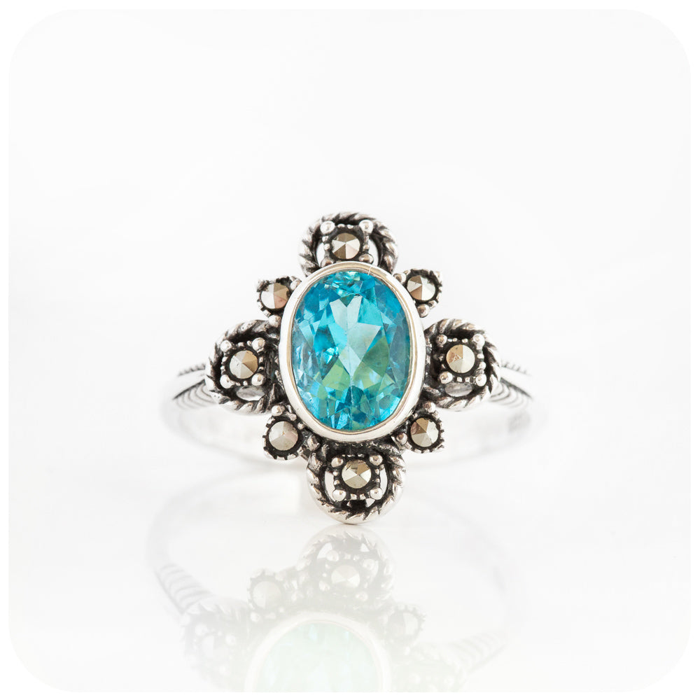 Oval cut Swiss Blue Topaz and Marcasite Ring in Sterling Silver