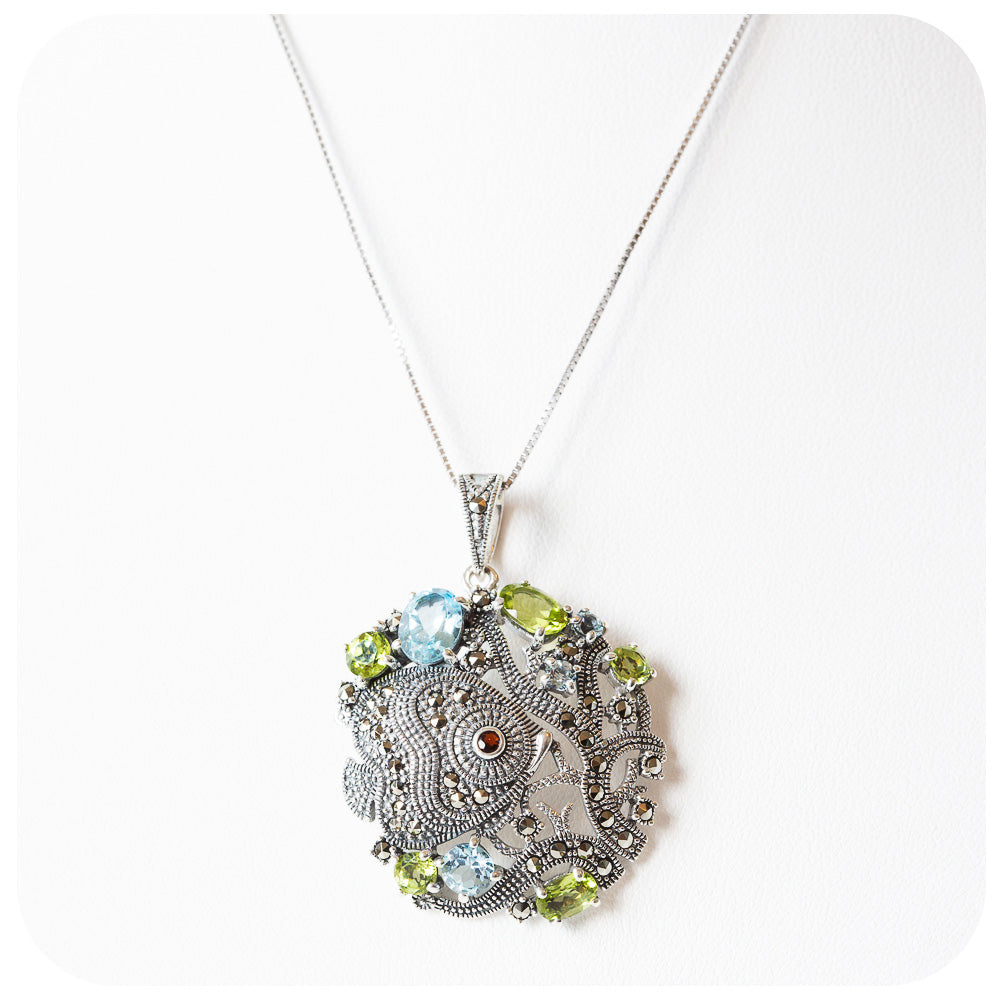 The Angel Fish, Blue Topaz and Peridot Pendant and Chain in Sterling Silver