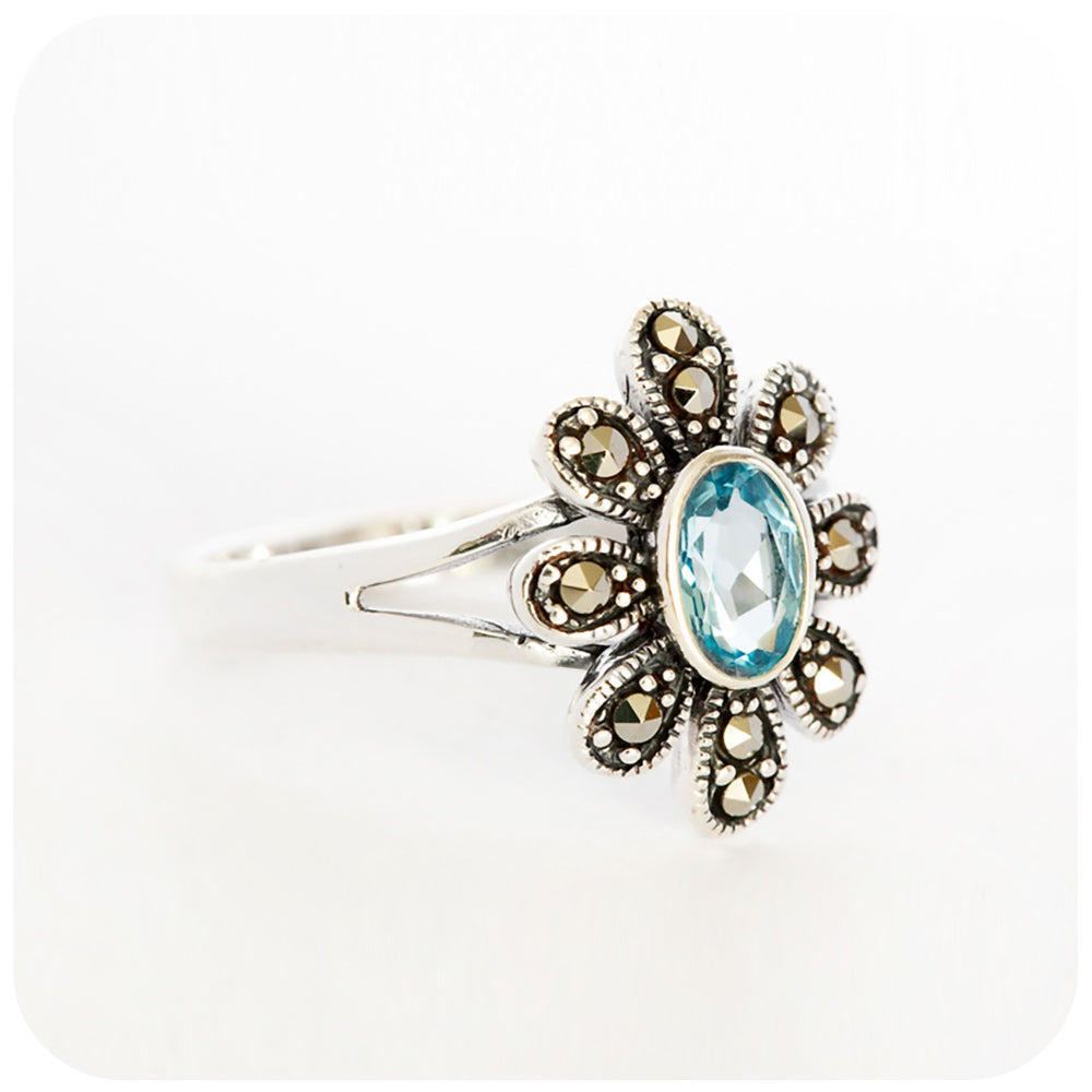 Oval cut Swiss Blue Topaz and Marcasite Flower Ring in Sterling Silver