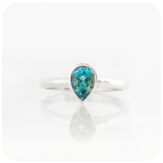 Pear cut Swiss Blue Topaz tube set solitaire ring - Victoria's Jewellery