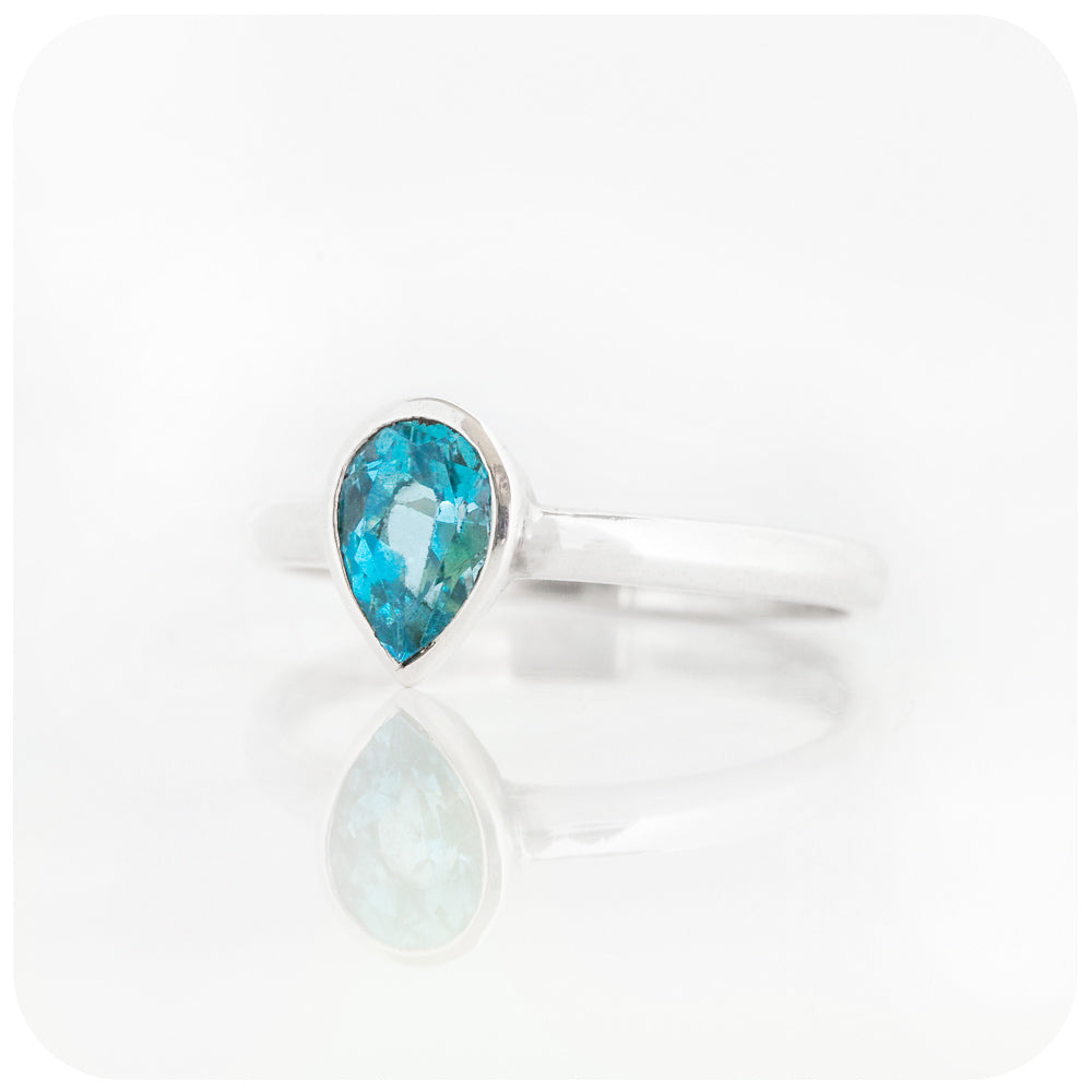 Pear cut Swiss Blue Topaz tube set solitaire ring - Victoria's Jewellery