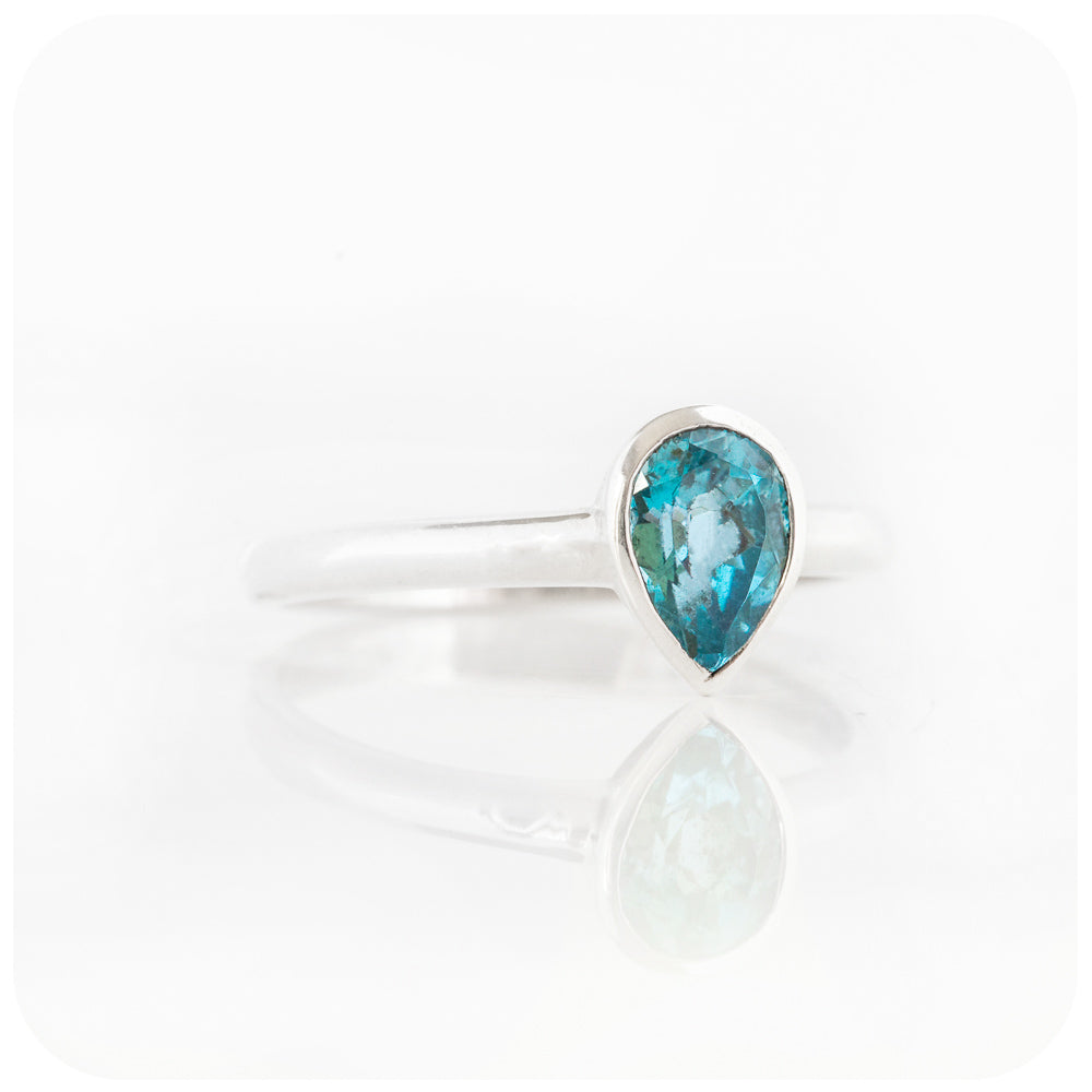 Pear cut Swiss Blue Topaz tube set solitaire ring - Victoria's Jewellery