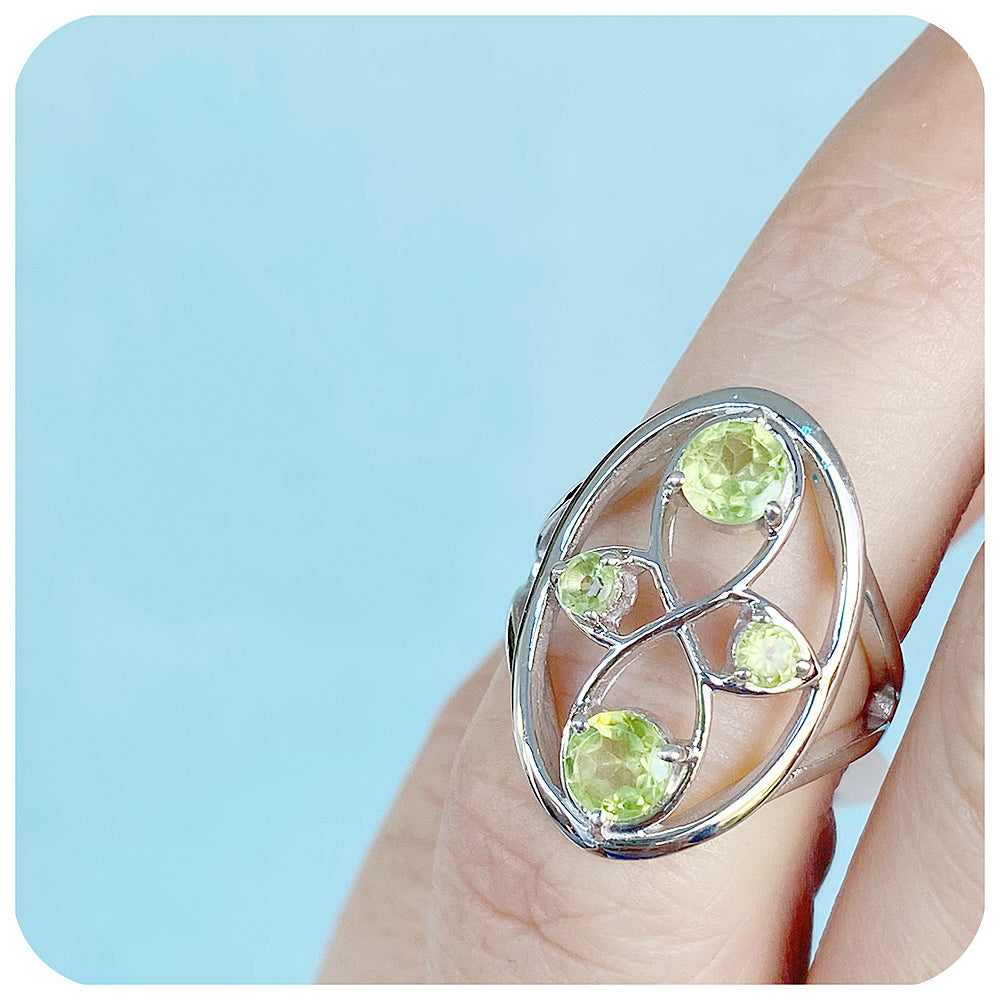 Infinity Peridot Ring in Sterling Silver