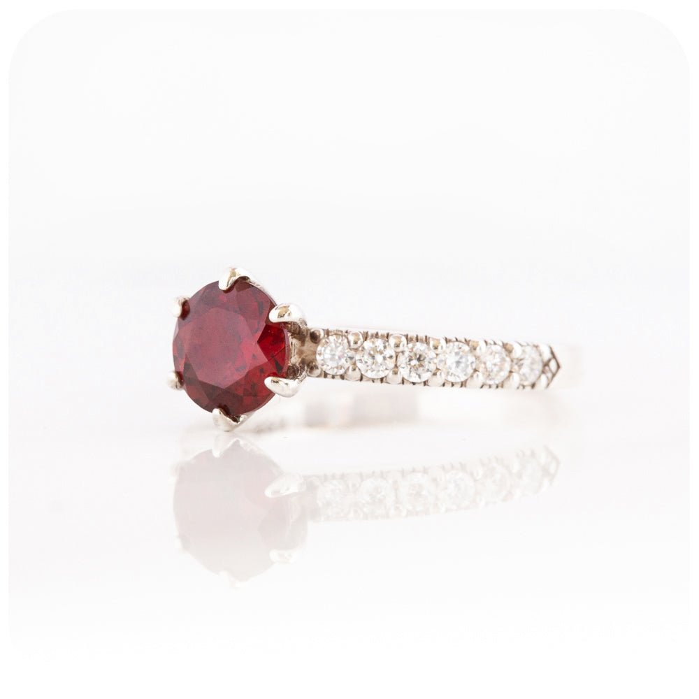 brilliant cut garnet and cubic accent engagement ring