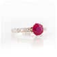 brilliant cut ruby and cubic accent engagement ring