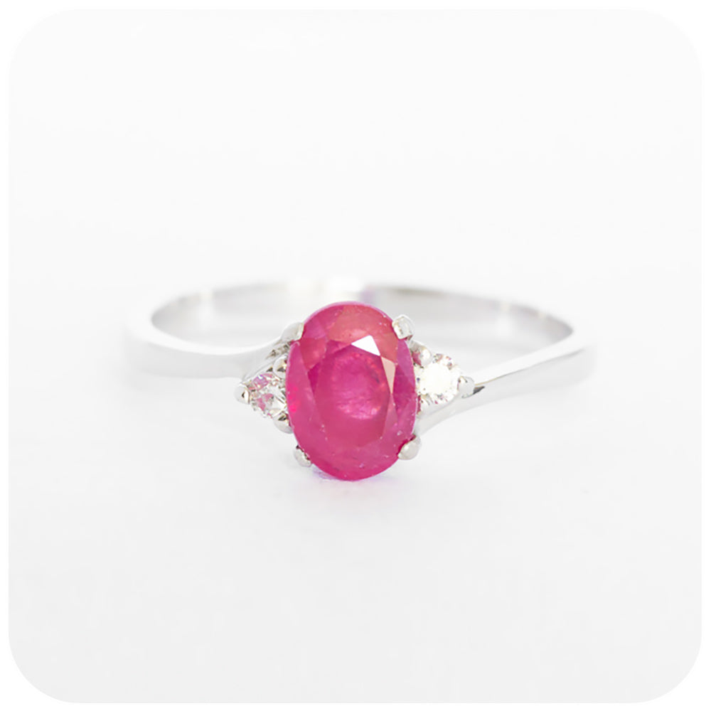 Oval cut Ruby and Cubic Zirconia Ring in Sterling Silver
