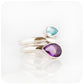 The Twin Pear cut Sky Blue Topaz and Amethyst Ring in Sterling Silver