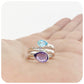 The Twin Pear cut Sky Blue Topaz and Amethyst Ring in Sterling Silver