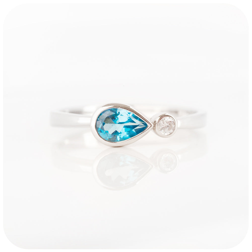 Pear cut swiss blue topaz and cubic zirconia east-west ring - Victoria's Jewellery