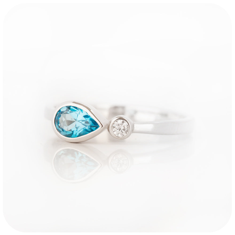 Pear cut swiss blue topaz and cubic zirconia east-west ring - Victoria's Jewellery