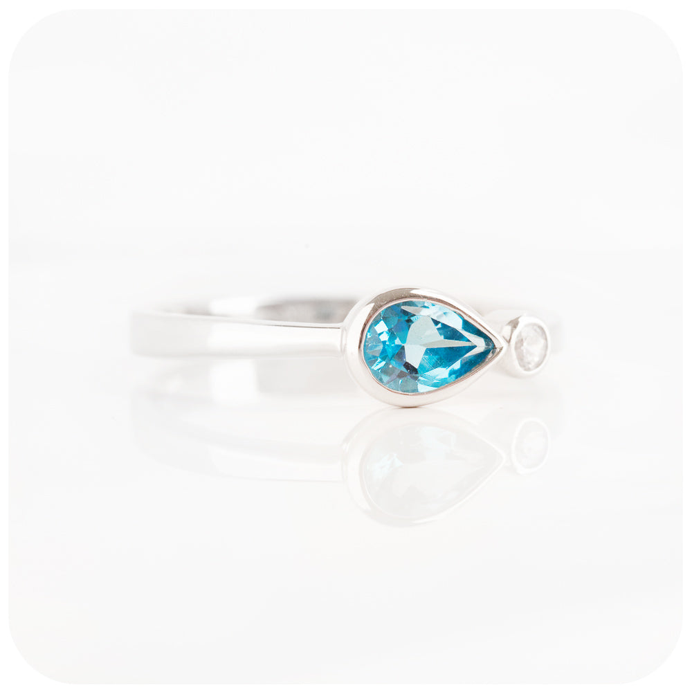 Pear cut swiss blue topaz and cubic zirconia east-west ring - Victoria's Jewellery