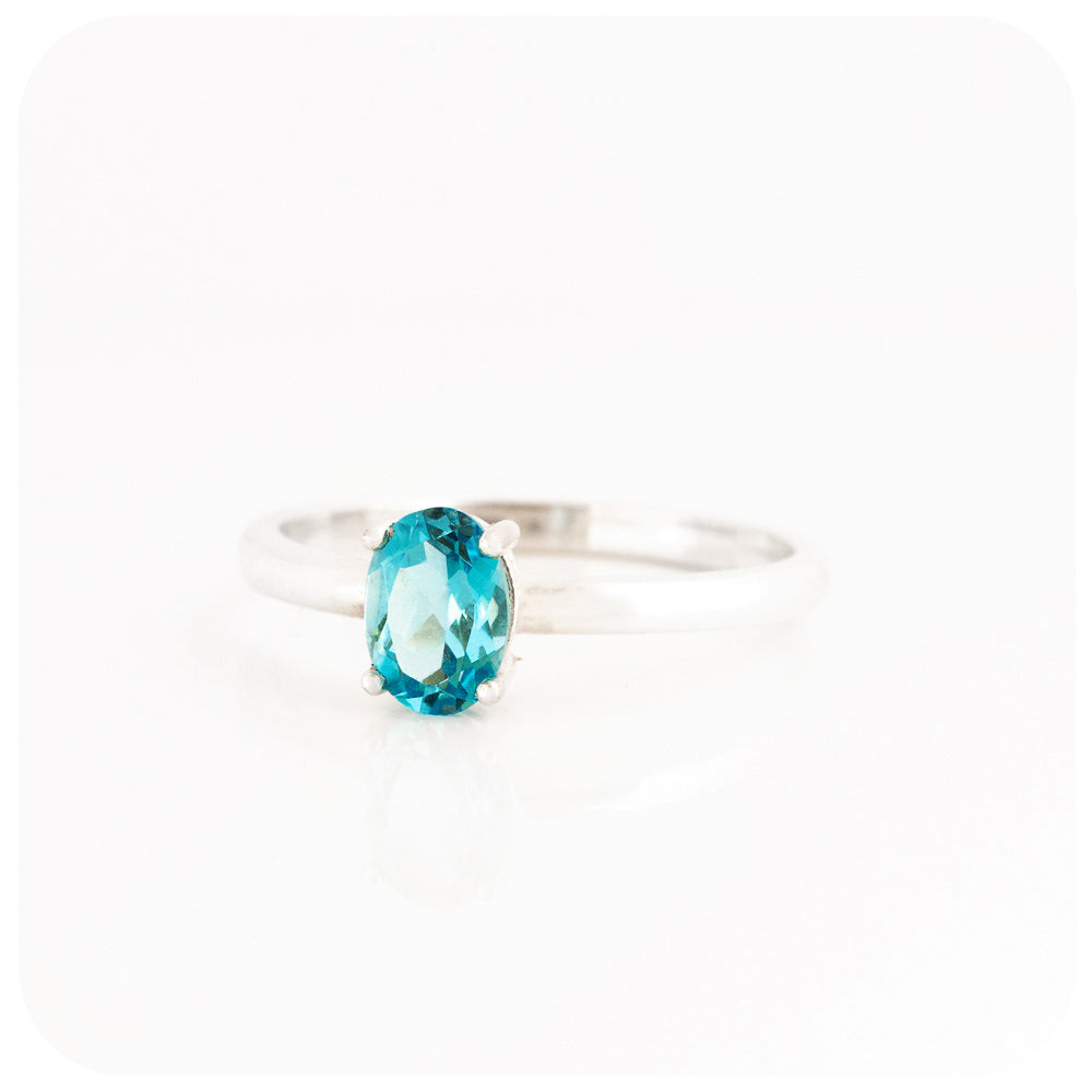 Oval cut Swiss Blue Topaz Solitaire Ring