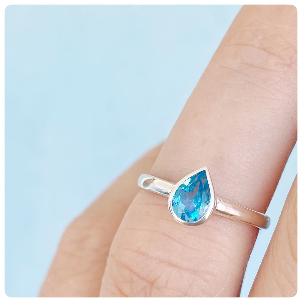 Pear cut Swiss Blue Topaz Solitaire Ring in Sterling Silver