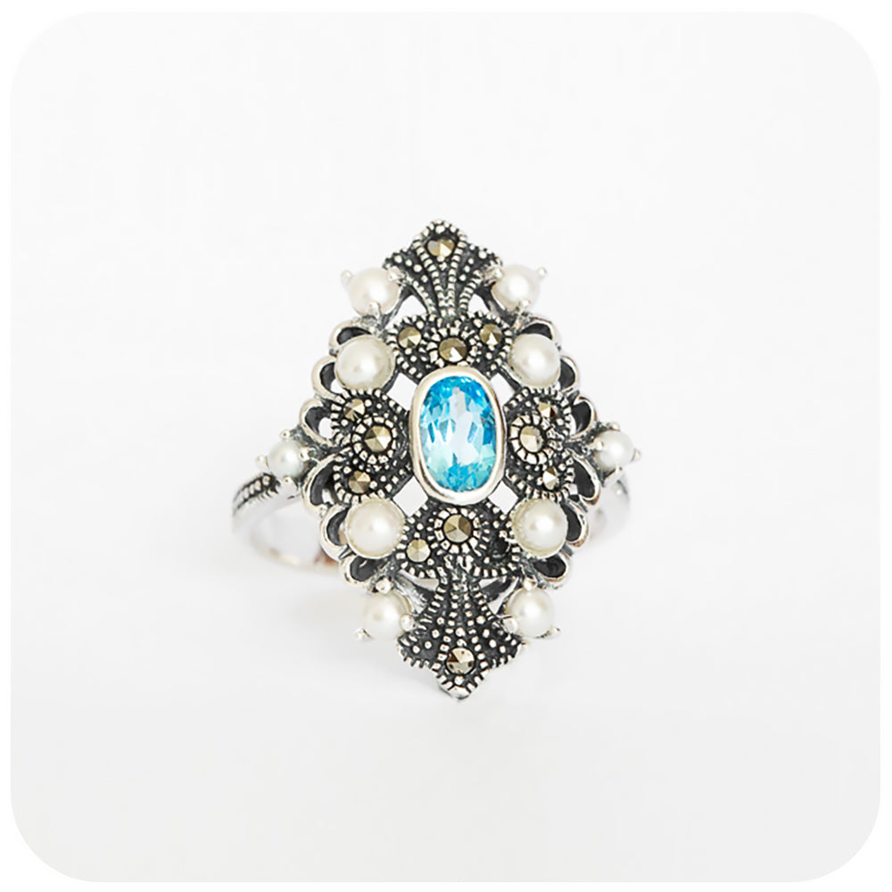 oval cut blue topaz and fresh water pearl vintage inspired ring