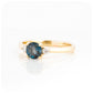teal london blue topaz and moissanite trilogy style enagement ring in yellow gold - Victoria's Jewellery