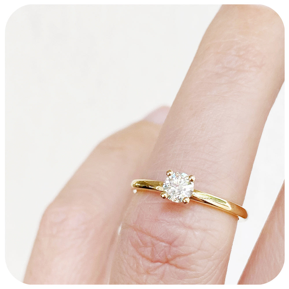 brilliant round cut moissanite solitaire engagement ring