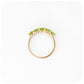 Danelle, a Peridot Half Eternity Trellis Ring