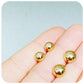 yellow gold dome shape stud earrings